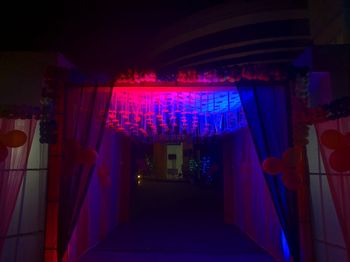 Illuminated corridor of building