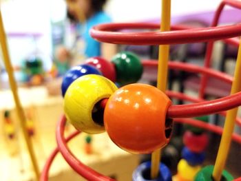 Close-up of multi colored ball on table