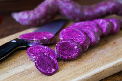 Close-up of chopped sweet potato on cutting board 