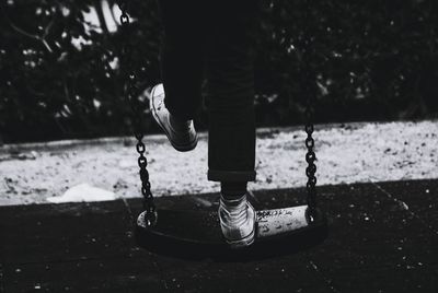 Low section of person on swing