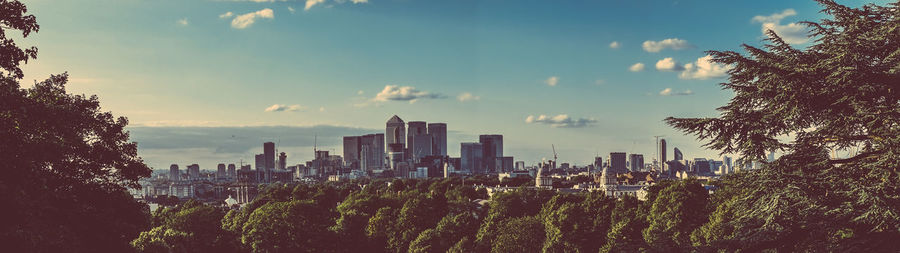 View of city against cloudy sky