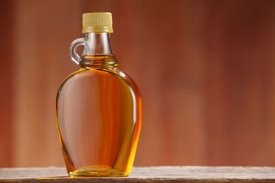 Close-up of honey in jar on table