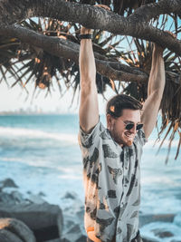 Low section of man on beach