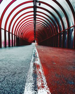 Surface level of empty road in tunnel