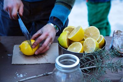 Midsection of man preparing food