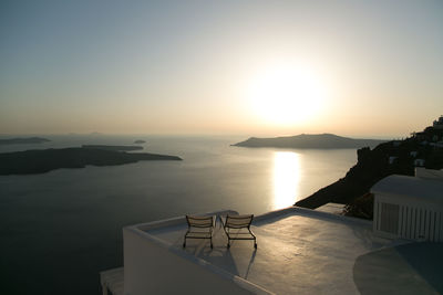 Scenic view of sea against clear sky during sunset