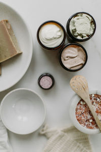 High angle view of natural creams in jars