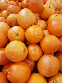 Full frame shot of oranges in market