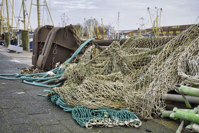 Fishing net on pier at harbor