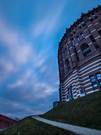 Low angle view of building against blue sky