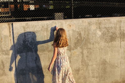 Group of people standing in the dark