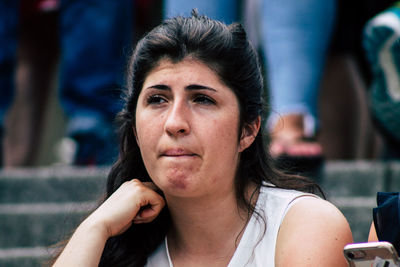 Portrait of woman looking down