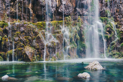 View of waterfall in forest