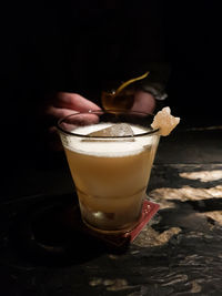 Close-up of coffee with drink on table