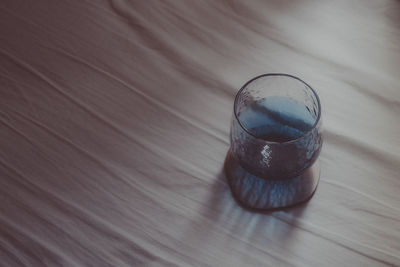 High angle view of glass on table