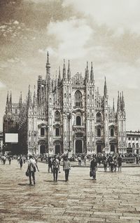 Group of people in front of building