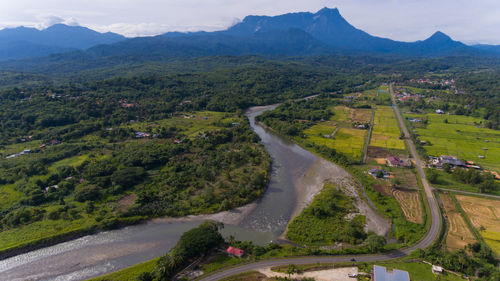 High angle view of road amidst landscape against sky