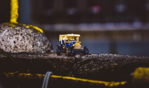 Close-up of stuffed toy on rock