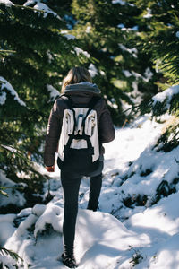 Rear view of man in snow