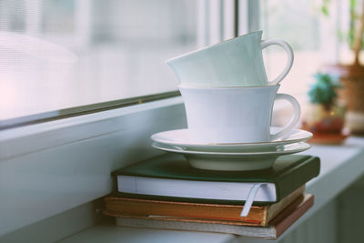 Close-up of coffee cup on table