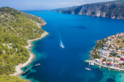 High angle view of sea amidst trees