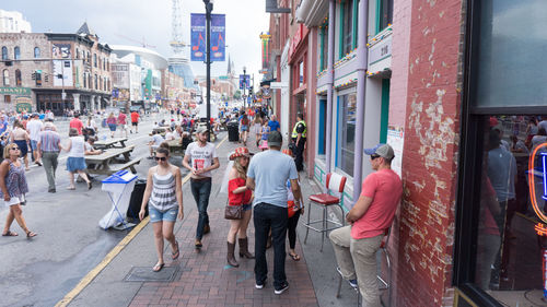 People walking on city street