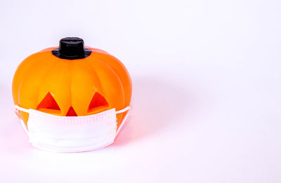 High angle view of orange pumpkin against white background