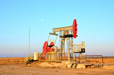 Construction site on field against clear sky