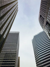 Low angle view of skyscrapers against sky