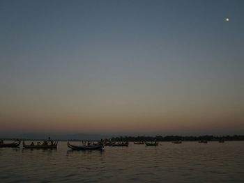 Scenic view of sea at sunset