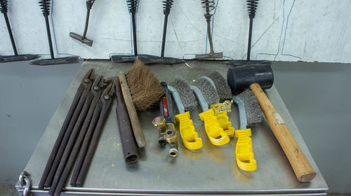 High angle view of tools in container