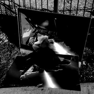 Young woman holding camera