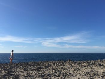 Scenic view of calm sea against sky