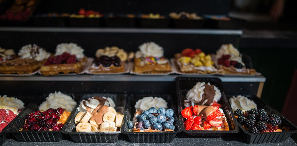 High angle view of fresh food in containers for sale at store