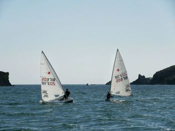 Boats sailing in sea