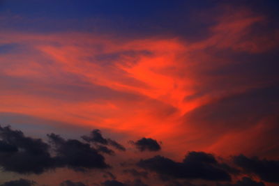 Low angle view of dramatic sky during sunset