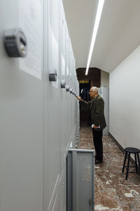 Man standing in locker room