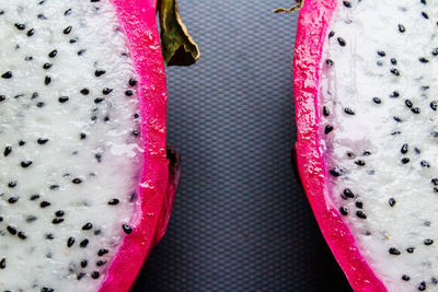 High angle view of pink fruit in container