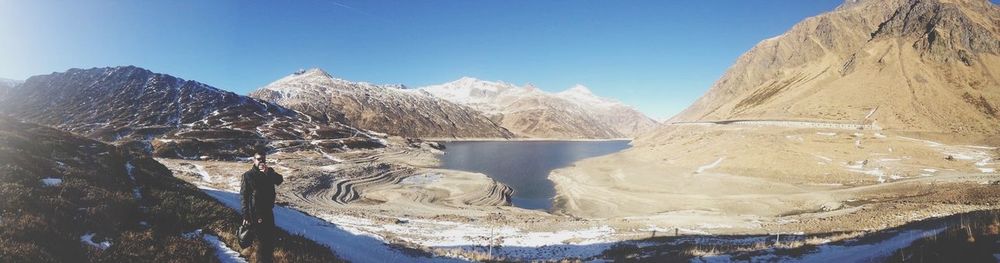 Scenic view of snow covered mountains