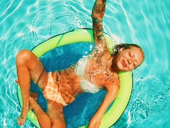 High angle view of baby girl in swimming pool