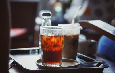 Close-up of beer glass on table