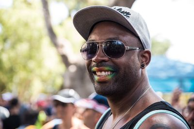 Portrait of smiling man wearing sunglasses