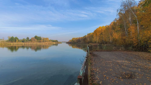 Scenic view of lake against sky during autumn