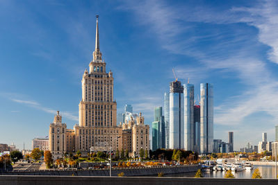 Modern buildings in city against sky