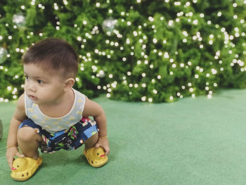 Cute boy playing with toy