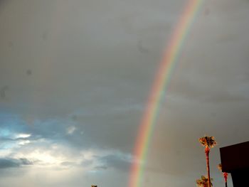 Low angle view of rainbow over the sky