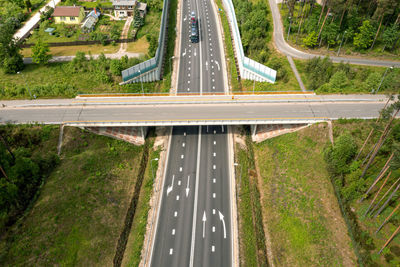 High angle view of road amidst plants in city