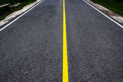 Asphalt road with yellow traffic line. transportation concept. road texture background.	
