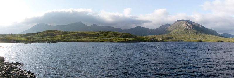 Six mountains of the twelve bens range in connemara seen across a lake