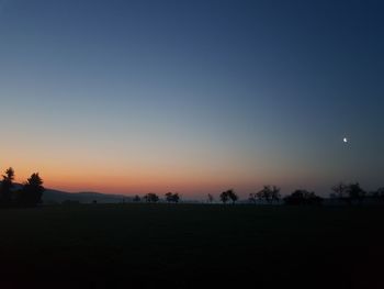 Scenic view of silhouette landscape against sky during sunset